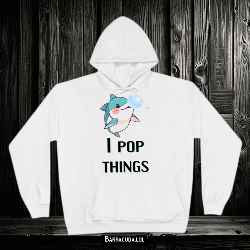 Funny barracuda hoodie, illustrating a barracuda comically chasing a soap bubble with exaggerated joy and playful abandon.