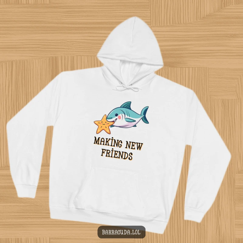Funny Barracuda hoodie featuring a playful barracuda gently nudging a starfish, offering warmth and humor inspired by the sea.