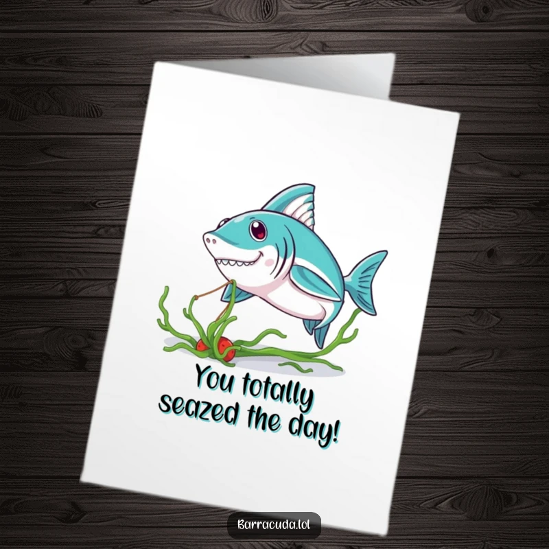 Funny Free Printable Congratulations Card showing a kawaii barracuda triumphantly holding seaweed, celebrating success.